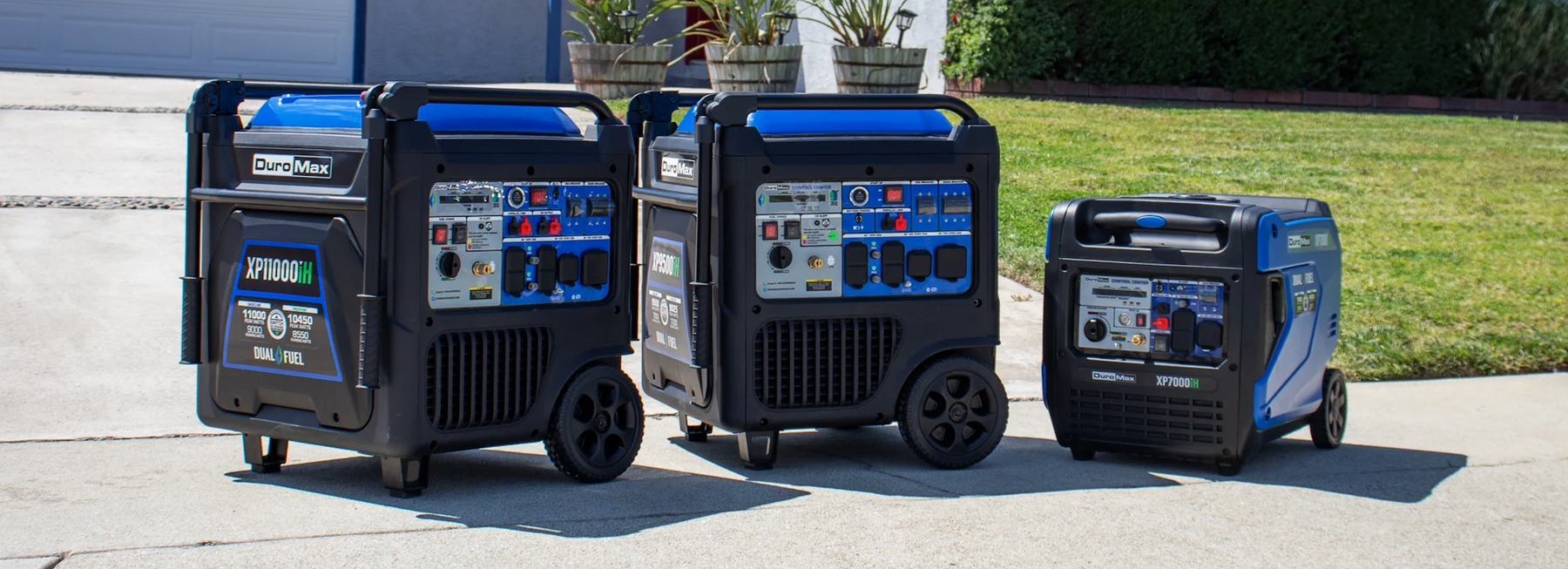 Portable home backup generators in different wattage sizes displayed on a residential driveway for generator size comparison