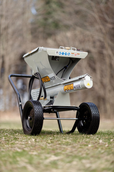 MudMixer Evolution parked on grass, rear three-quarter view