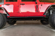 DV8 Offroad 2007-2018 4-Door Jeep Wrangler JK OE Plus Side Steps – installed on vehicle, image 10 of 16