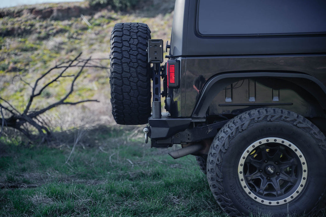 DV8 Offroad 2007-2018 Jeep Wrangler JK Tire Carrier for MTO Bumper – installed on vehicle, image 11 of 20