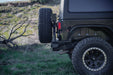 DV8 Offroad 2007-2018 Jeep Wrangler JK Tire Carrier for MTO Bumper – installed on vehicle, image 11 of 20