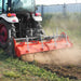 90 in Heavy Duty Rotary Tiller,  3 Point Hitch Cat.2,  Gear Drive,  PT — lifestyle view