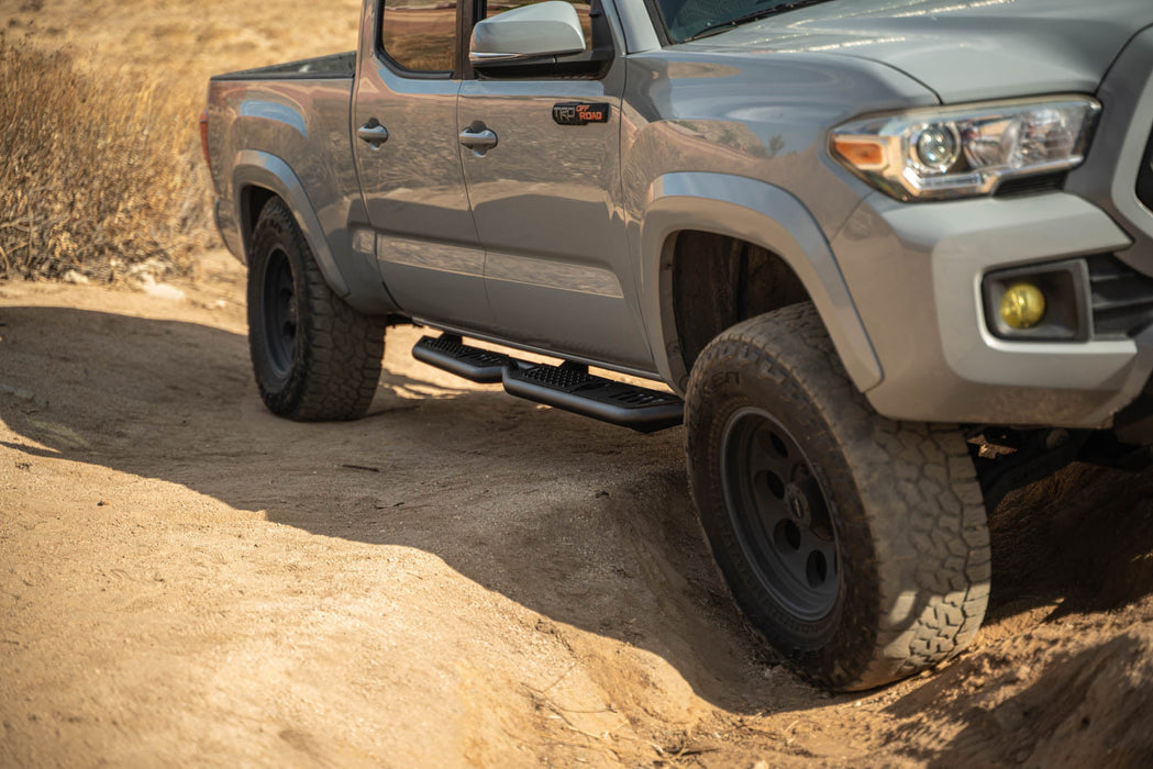 DV8 Offroad 2016-2023 Toyota Tacoma Crew Cab OE Plus Side Steps – on the trail, image 5 of 12
