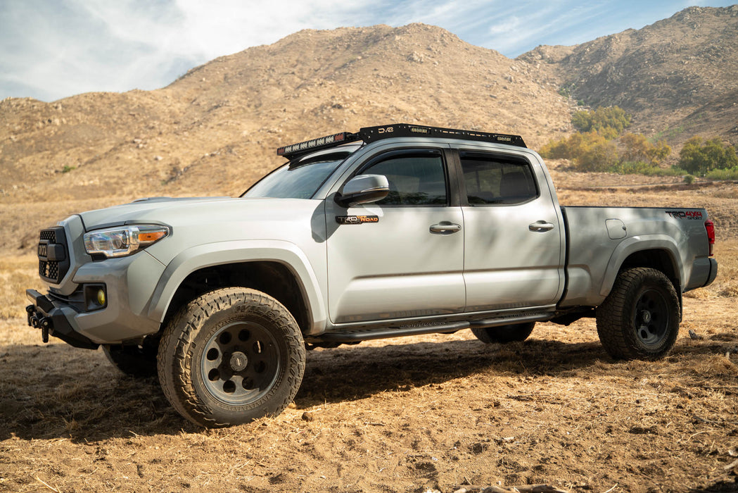 DV8 Offroad 2016-2023 Toyota Tacoma Crew Cab OE Plus Side Steps – on the trail, image 8 of 12