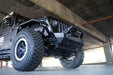 DV8 Offroad 2018-2026 Jeep JL & JT Sway Bar Disconnect Skid Plate – installed on vehicle, image 14 of 20