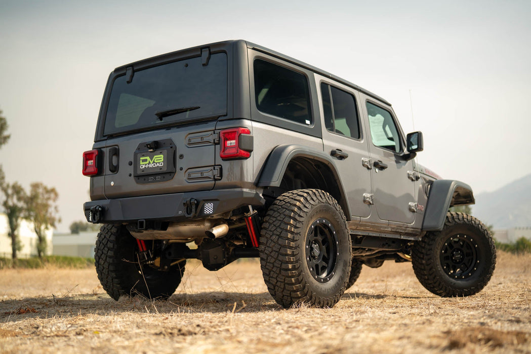 DV8 Offroad 2018-2026 Jeep Wrangler JL Spare Tire Delete w/ Camera Holder – on the trail, image 9 of 10