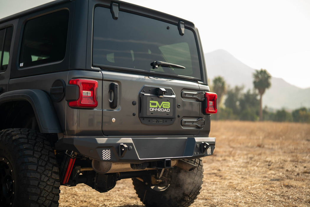 DV8 Offroad 2018-2026 Jeep Wrangler JL Spare Tire Delete w/ Camera Holder – on the trail, image 5 of 10