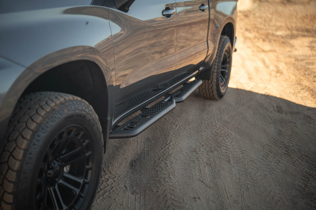 DV8 2019-2026 GMC Sierra 1500 & Chevrolet Silverado 1500 Crew Cab OE Plus Side Steps – installed on vehicle, image 14 of 19