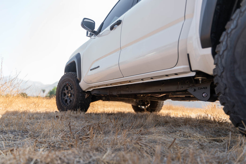 DV8 Offroad 2024-2026 Toyota Tacoma Trailing Arm Skid Plates – installed on vehicle, image 6 of 13