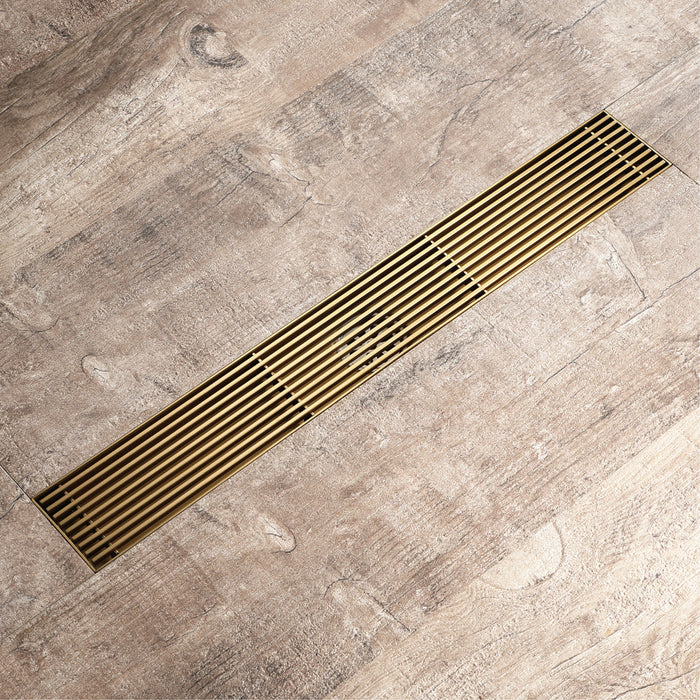 Brushed gold Linear shower drain stainless steel material 35.4 inch with grid cover with hair strainer and adjustment feet - angle view