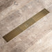Brushed gold Linear shower drain stainless steel material 35.4 inch with grid cover with hair strainer and adjustment feet - angle view