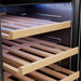 Wood shelf detail inside the Empava EMPV-WC09S wine cooler with interior lighting