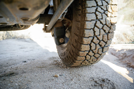DV8 Offroad 2010-2024 Toyota 4Runner Rear Shock Skid Plates – installed on vehicle, image 2 of 9