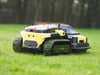 Autonomous mower handling steep grassy slope with precision control