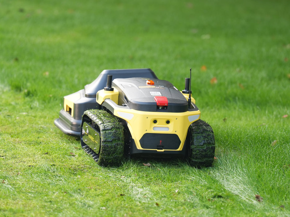 Robotic lawn mower cutting thick grass efficiently
