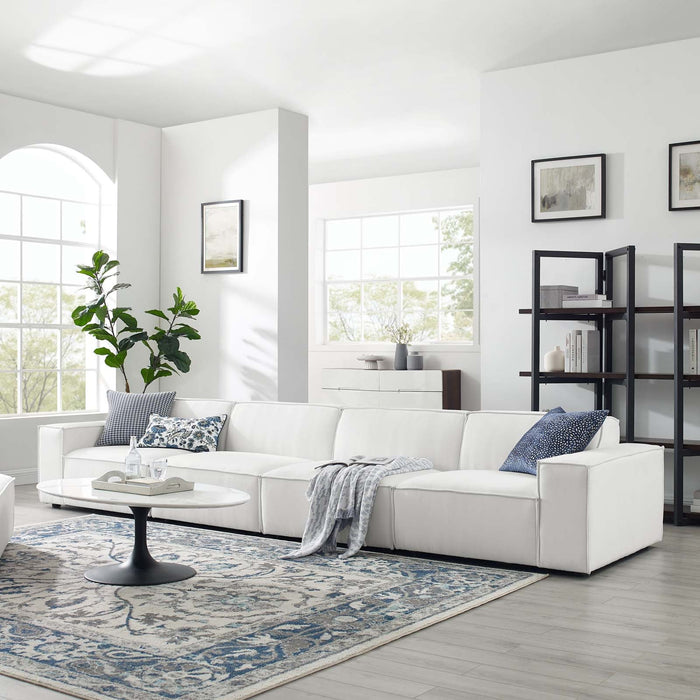 Restore 4-Piece Sectional Sofa - Luxurious Upholstered Design with Modular Connectors and Piping