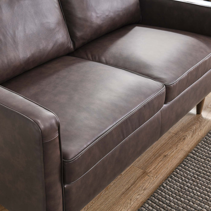Impart Genuine Leather Loveseat - in lifestyle setting