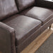 Impart Genuine Leather Loveseat - in lifestyle setting