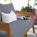 Brisbane Teak Wood Outdoor Patio Loveseat - in lifestyle setting