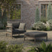 Modway Eleni 2-Piece Outdoor Teak Wood Armchair and Ottoman Set in Weathered Gray Flint - angled view
