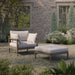 Modway Eleni 2-Piece Outdoor Teak Wood Armchair and Ottoman Set in Weathered Gray Pebble - angled view