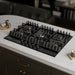 Empava EMPV-30GC26-GX built-in gas cooktop installed in a kitchen, side view