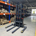 2640lbs Electric Straddle Stacker,  98" Lift,  Adjustable Legs & Forks — angle view