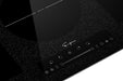 Angled close-up of the Empava EMPV-IDCF9 control panel and central cooking zone