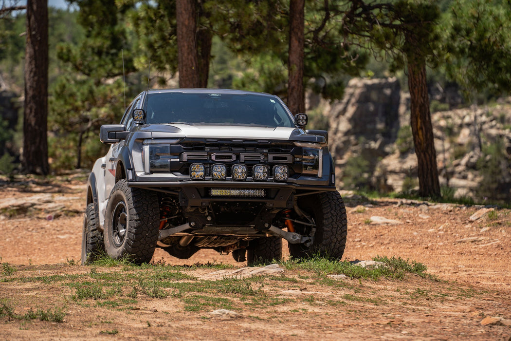Addictive Desert Designs 2021-2026 Ford F-150 Raptor Pro Plus Bolt-On Front Bumper – on the trail, image 10 of 16