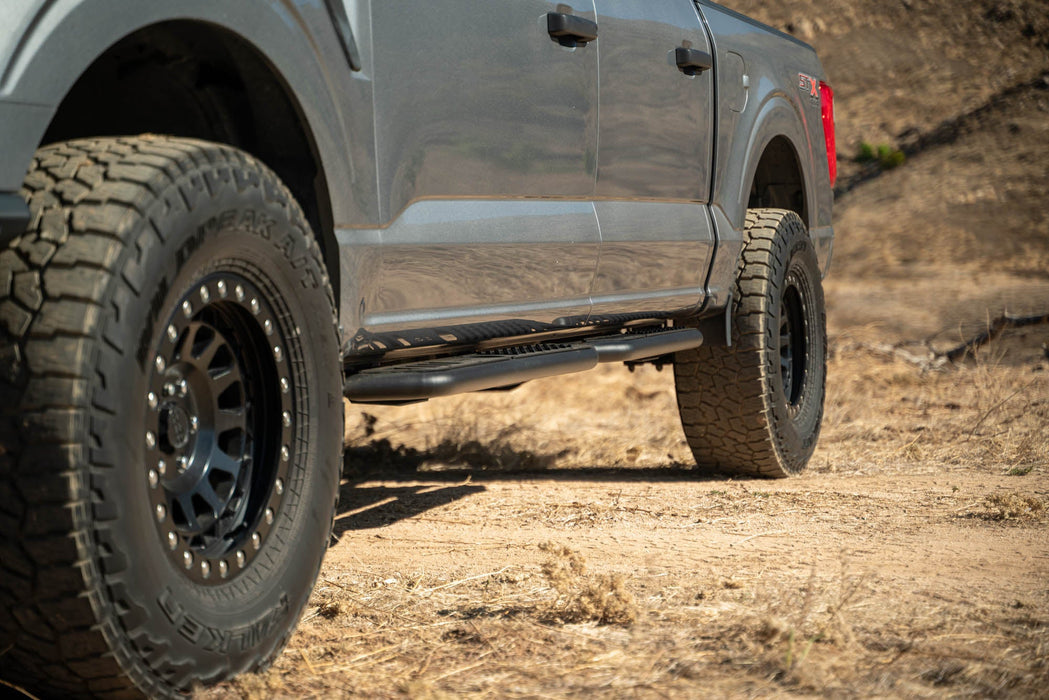 DV8 Offroad 2015-2026 Ford F-150 Crew Cab & Raptor OE Plus Side Steps – installed on vehicle, image 7 of 15