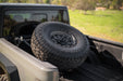 DV8 Offroad 2020-2025 Jeep Gladiator JT Adjustable In-Bed Spare Tire Carrier – on the trail, image 2 of 18