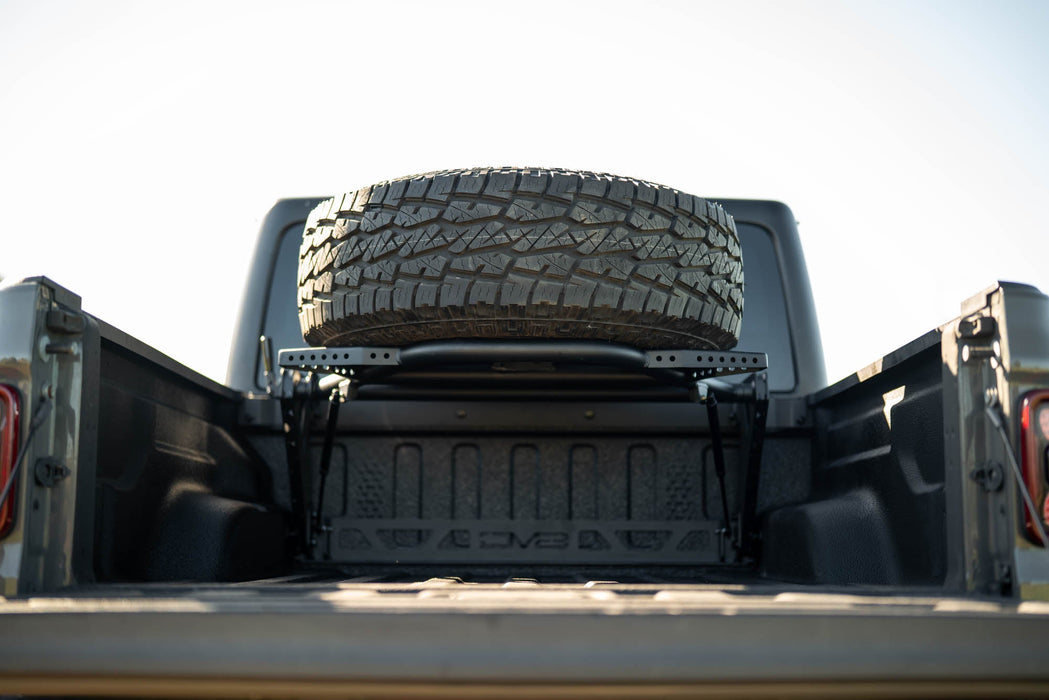 DV8 Offroad 2020-2025 Jeep Gladiator JT Adjustable In-Bed Spare Tire Carrier – on the trail, image 14 of 18