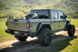 DV8 Offroad 2020-2025 Jeep Gladiator JT Adjustable In-Bed Spare Tire Carrier – on the trail, image 8 of 18