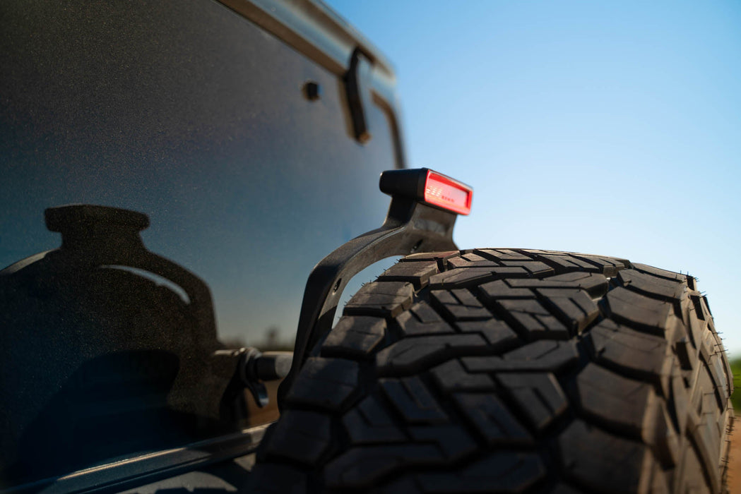 DV8 Offroad 2018-2026 Jeep Wrangler JL MTO Series Bumper Spare Tire Swing Gate – installed on vehicle, image 8 of 17