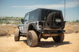 DV8 Offroad 2007-2018 Jeep Wrangler JK Body Mounted Tire Carrier – installed on vehicle, image 6 of 17