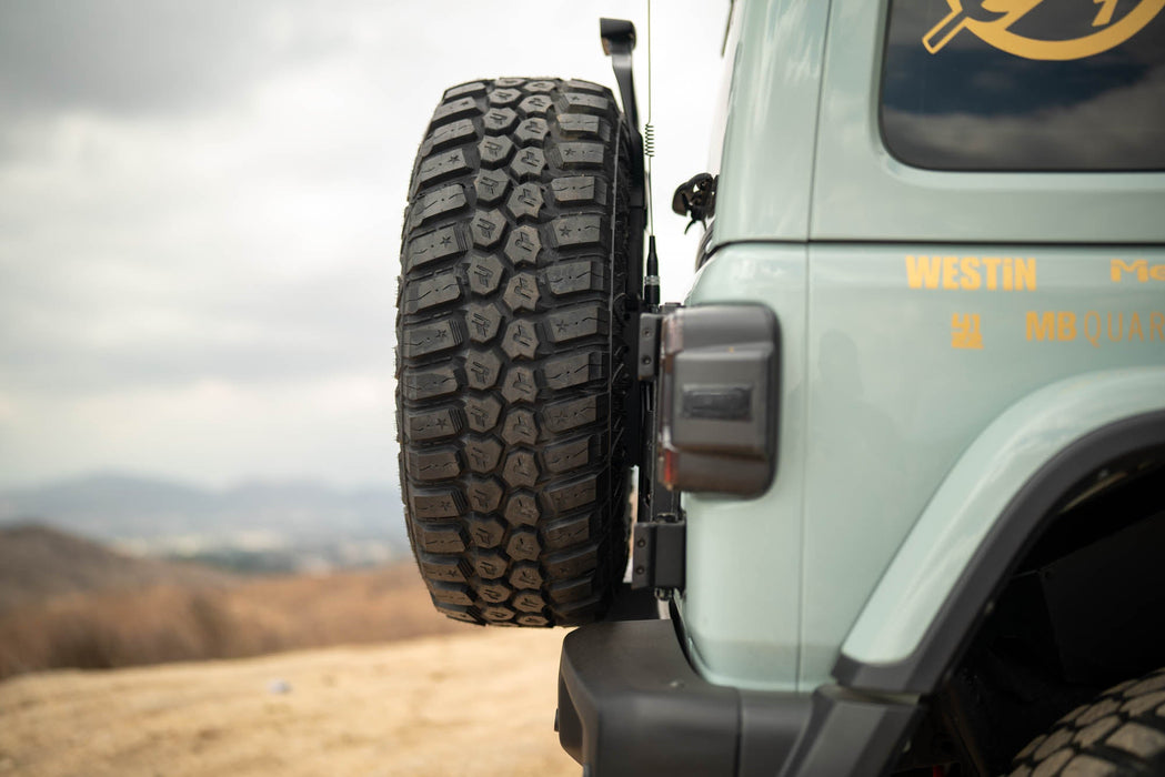 DV8 Offroad 2018-2026 Jeep Wrangler JL Spare Tire Carrier – installed on vehicle, image 15 of 20