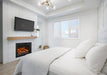Napoleon Rosedale Electric 3 built-in electric fireplace insert in a bedroom