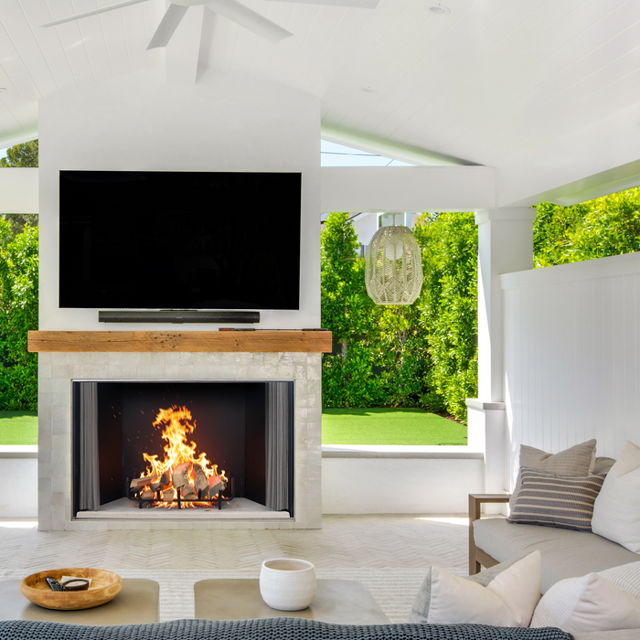 Empire Aspen 60 outdoor wood burning fireplace on a patio