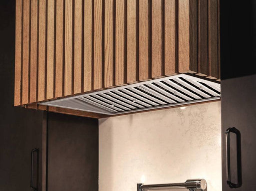 Victory Q2 range hood insert installed in custom kitchen hood