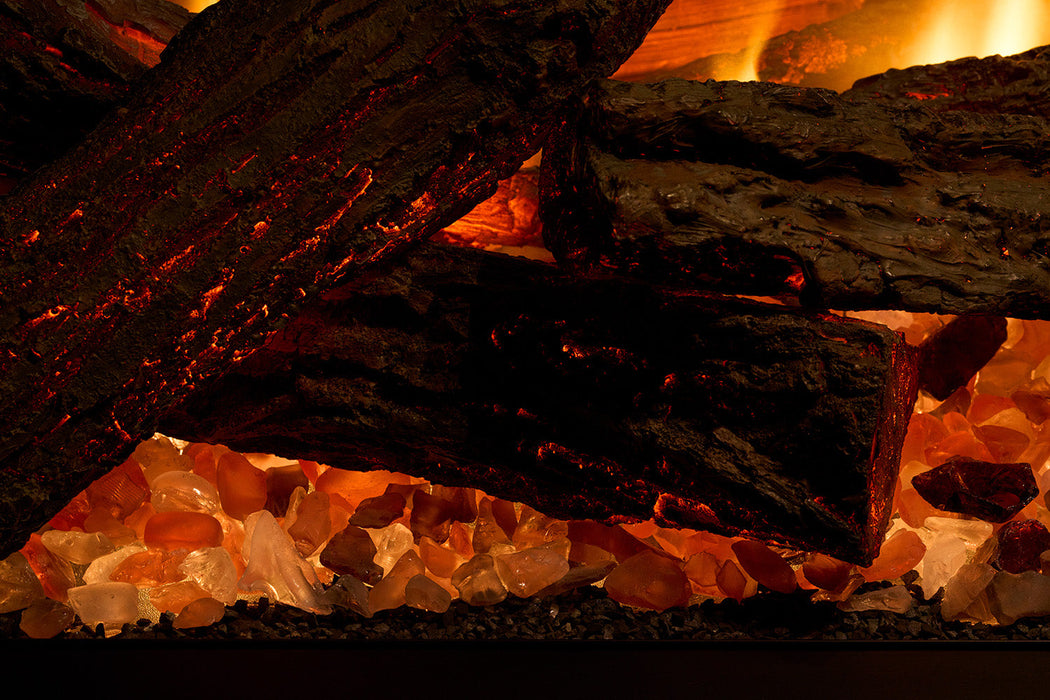 Close-up of the tumbled glass and ember bed media in the Dimplex Ignite Quest
