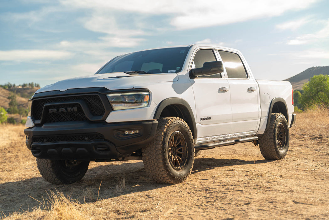 DV8 Offroad 2019-2025 RAM 1500 Crew Cab OE Plus Side Steps – installed on vehicle, image 9 of 14
