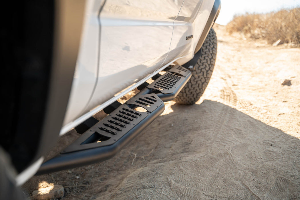 DV8 Offroad 2024-2026 Toyota Tacoma Double Cab OE Plus Side Steps – installed on vehicle, image 9 of 16