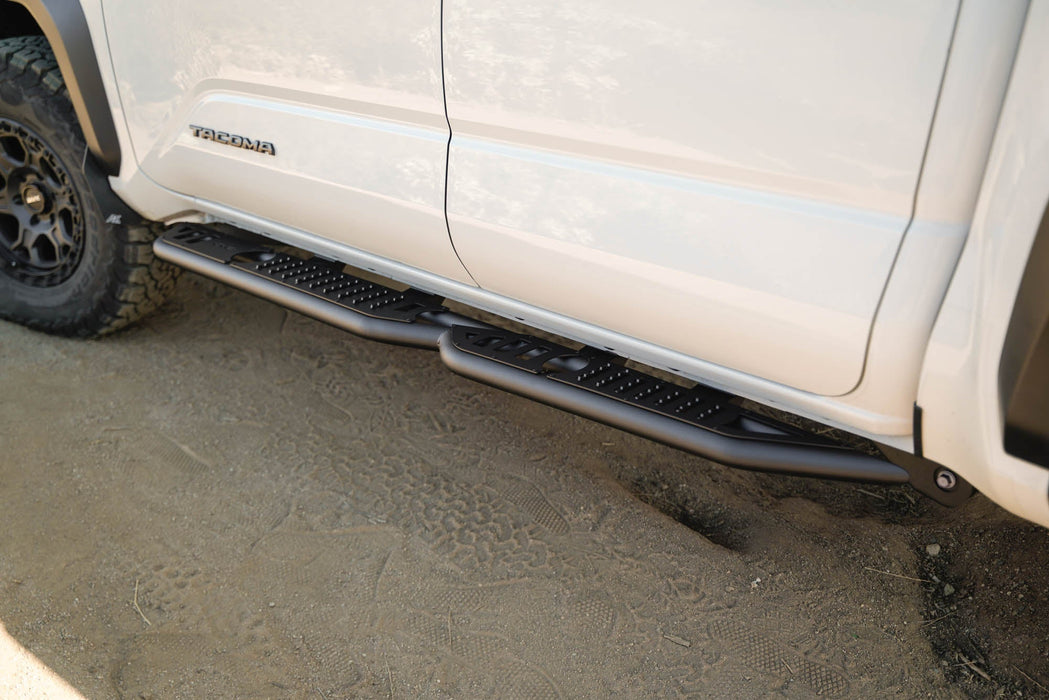 DV8 Offroad 2024-2026 Toyota Tacoma Double Cab OE Plus Side Steps – installed on vehicle, image 15 of 16