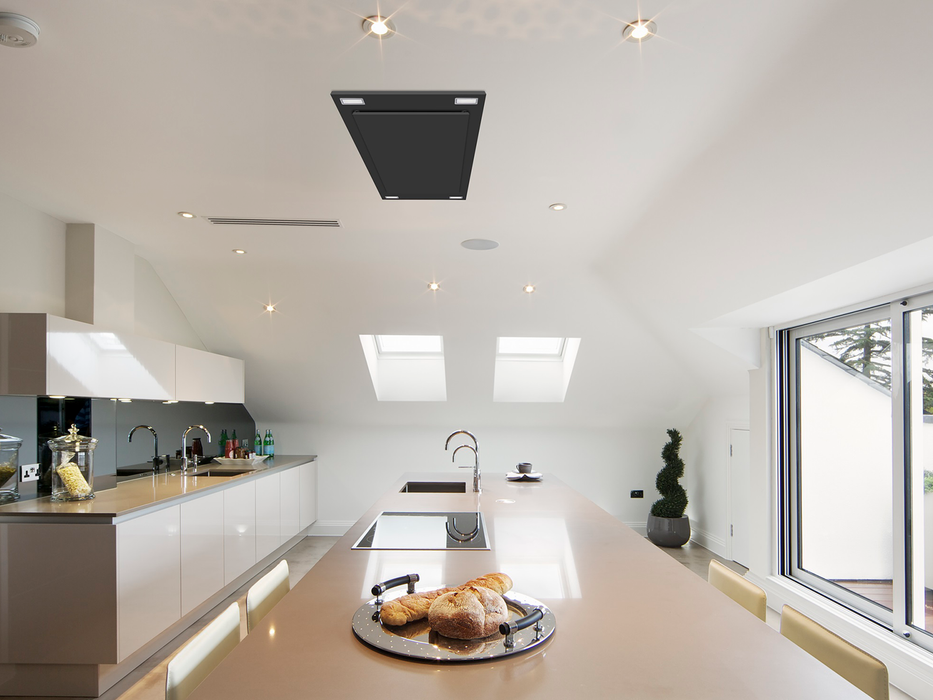 Matte black Victory Sunset ceiling range hood mounted in kitchen