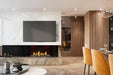 Napoleon Tall Bay Luxuria 50 natural gas linear fireplace in an open living room and kitchen