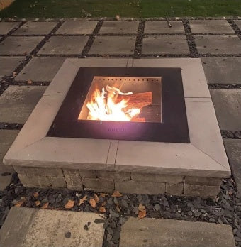 TessaRai square fire pit capstones (TRSQFPCAP) on a square tumbled wall fire pit