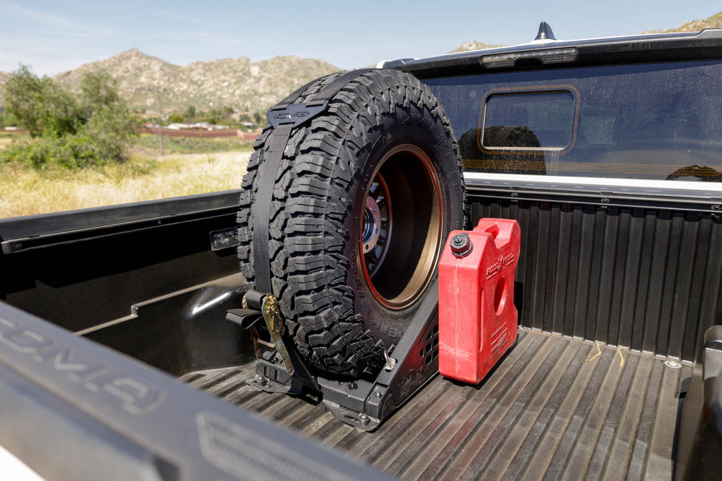 DV8 Offroad Truck Bed Universal Tire Carrier & Accessory Mount – installed on vehicle, image 11 of 19