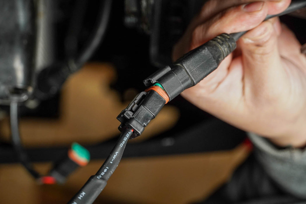 DV8 Offroad 4-Way 1-DTP to 4-DTP Plug Harness – installed on vehicle, image 8 of 10