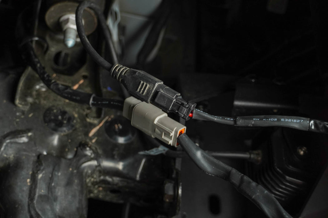 DV8 Offroad 4-Way 1-DTP to 4-DTP Plug Harness – installed on vehicle, image 10 of 10