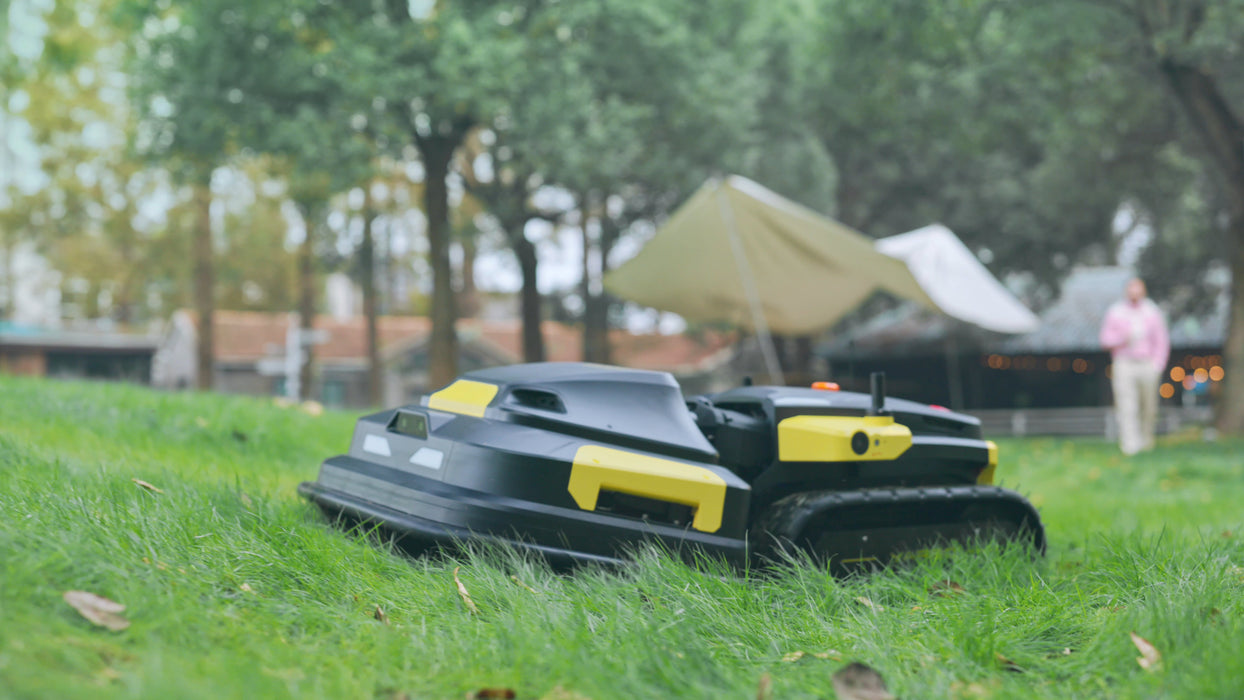 Side profile of Yarbo autonomous lawn mower on grass terrain